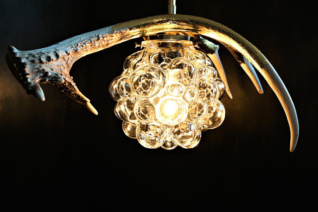 Real antlerl light with gold leaf