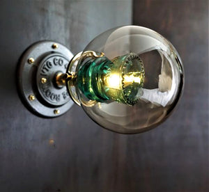 Industrial brass glass insulator wall light